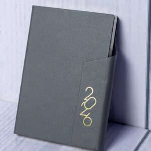 Luxurious Anthracite 2026 Diary Notebook in a textured vegan leather slipcase with gold foil year marking.